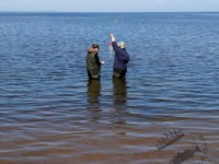 A.S. Demchuk and T.S. Ivanova are sampling zooplankton