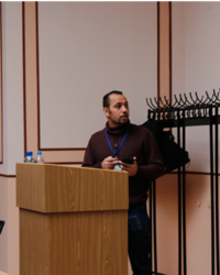 Ahmed during a presentation at the Scientific session of the ERS "Belomorskaia", St. Petersburg State University 2019.